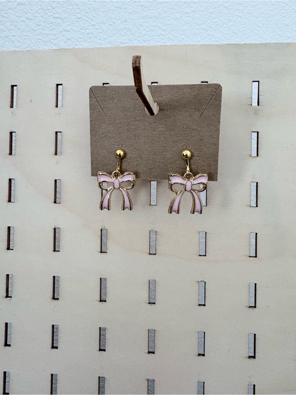 Handcrafted bow charm dangle clip on earrings